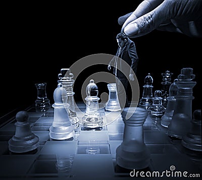 Businessman on a chessboard as a dummy Stock Photo