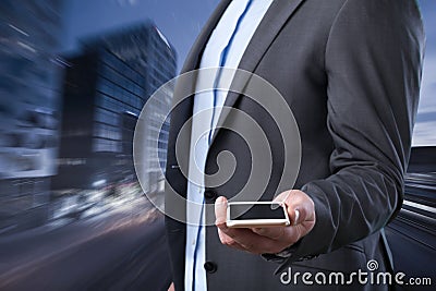 Businessman on city beauty night lanscape background Stock Photo