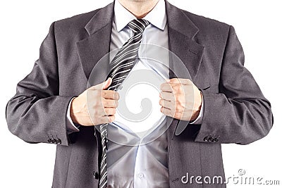 Businessman in classic superman pose Stock Photo