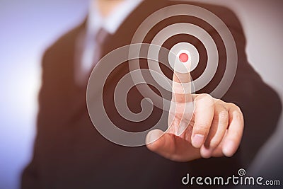 Businessman click on target. Business concept. Stock Photo