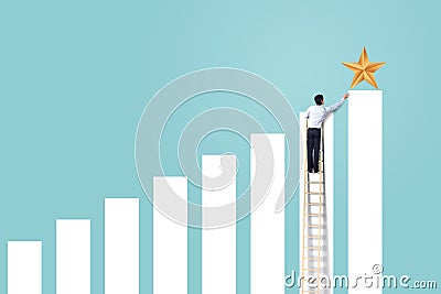 Businessman climb up rising graph on ladder to reach star, successful and win concept Stock Photo