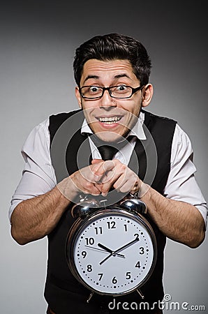 Businessman with clock Stock Photo