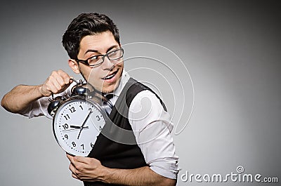 Businessman with clock Stock Photo