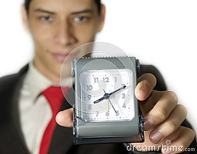 Businessman with a clock Stock Photo