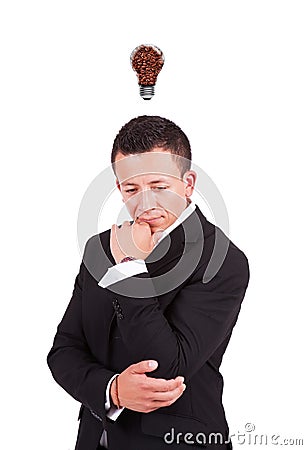 Businessman with coffee bulb over his head Stock Photo