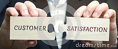 Businessman collects wooden puzzles with the word Customer Satisfaction CSat . It is a measure of how products and services Stock Photo