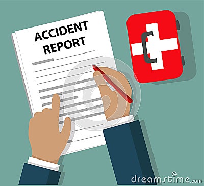 Businessman Completing Accident Report document beside First Aid Kit Health and Safety concept Stock Photo