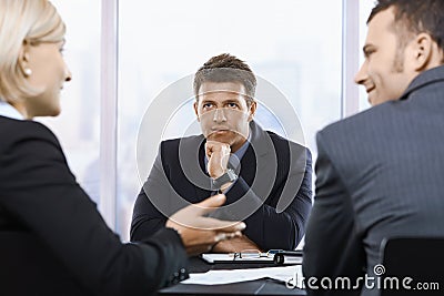 Businessman concentrating in office Stock Photo