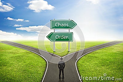 Businessman concept, Sign Chaos or Order road to the correct way Stock Photo