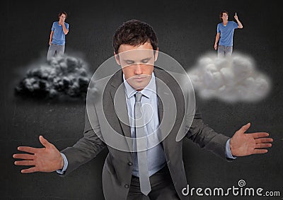 Businessman confused between being good or bad conscience Stock Photo