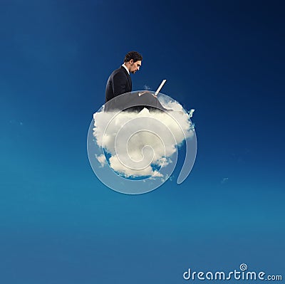 Businessman connected with his laptop over a cloud. concept of social network and internet addiction Stock Photo