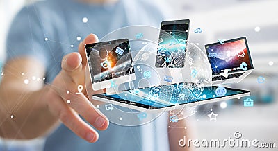 Businessman connecting tech devices to each other 3D rendering Stock Photo