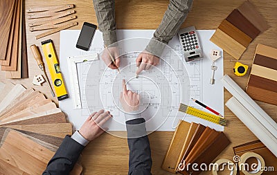 Businessman and construction engineer working together Stock Photo