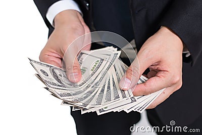 Businessman are counting pile money hundread dollas banknotes, After work, bonus, Large sum, Investment, Stock Photo