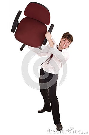 Businessman in crisis throw chair. Stock Photo