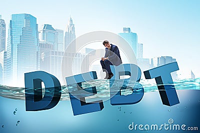 The businessman in debt business concept Stock Photo