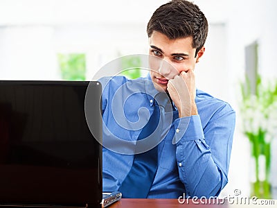 Businessman at desk Stock Photo