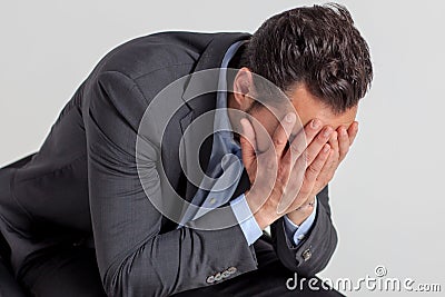 Businessman in despair Stock Photo