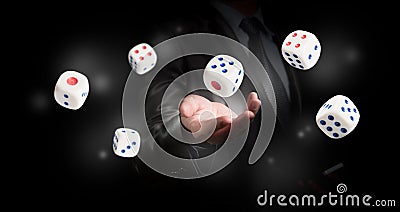 Businessman with dice Stock Photo