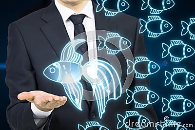 Businessman with different fish Stock Photo