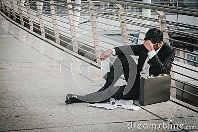 Businessman is disappointed from losing in stock exchange, economic crisis concept Stock Photo