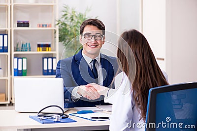 The businessman discussing health issues with doctor Stock Photo