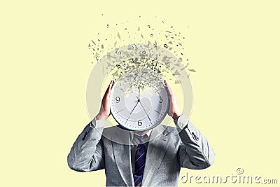 Businessman with a disintegrating clock instead of a head. Dispersion effect. Lack of time. Waste of time. Business. Lifestyle Stock Photo