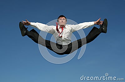 Businessman doing splits Stock Photo