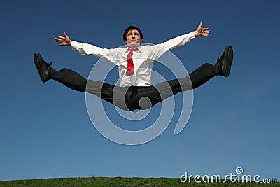 Businessman doing splits Stock Photo