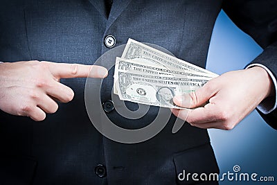 Businessman with dollars in his hand, concept for business and earn money Stock Photo