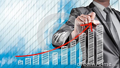 Businessman draw red curve with bar chart, business strategy Stock Photo