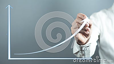Businessman drawing growth chart. Business concept Stock Photo
