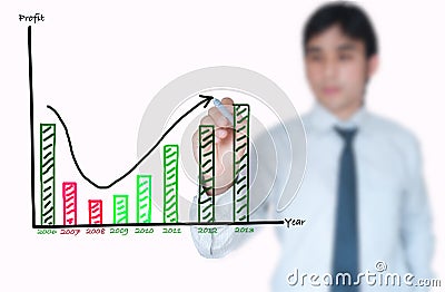 Businessman drawing increasing graph Stock Photo