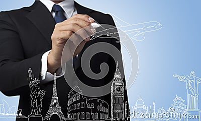 Businessman drawing travel around the world Stock Photo