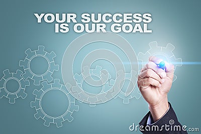 Businessman drawing on virtual screen. your success is our goal concept Stock Photo