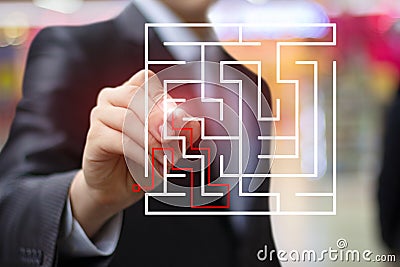 Businessman draws the solution to the maze . Stock Photo