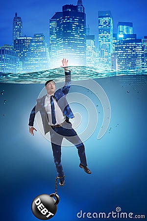 The businessman drowning in concept of high debt Stock Photo