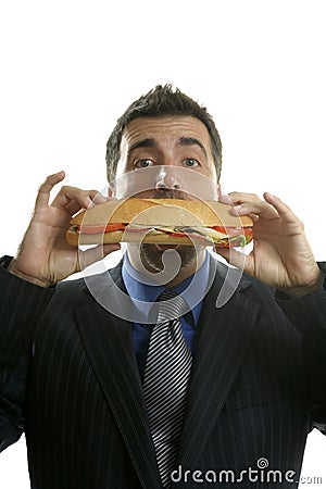 Businessman eating junk fast food Stock Photo