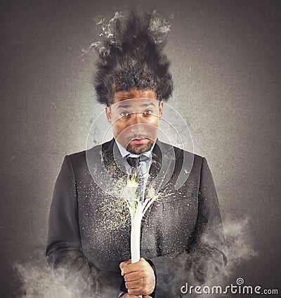 Businessman electrocuted Stock Photo