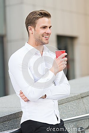 Businessman elegant guy drink tea or coffee. Break for relax and recharge energy caffeine beverage. Have cup of coffee Stock Photo