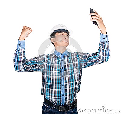 Businessman engineer thinking command with cell phone with 5g network, high-speed mobile Internet. and wear white safety helmet Stock Photo