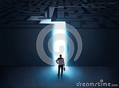 Man at the entrance to a maze Stock Photo