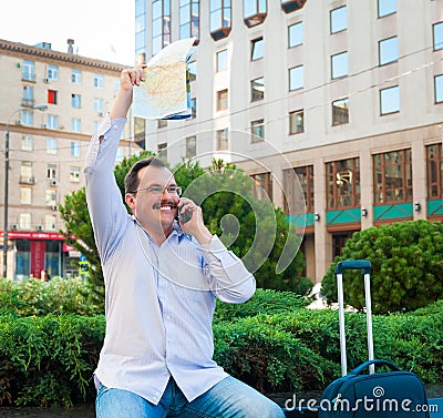 Businessman exploring the city guide Stock Photo
