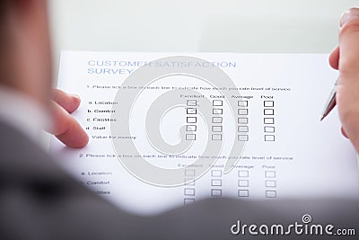 Businessman Filling Form Stock Photo