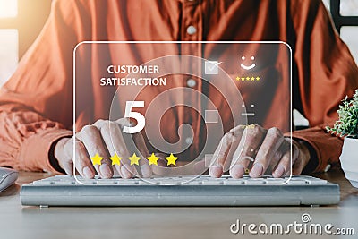 Businessman finger pointing smiley face emoticon on virtual touch screen.good feedback rating and positive customer review Stock Photo