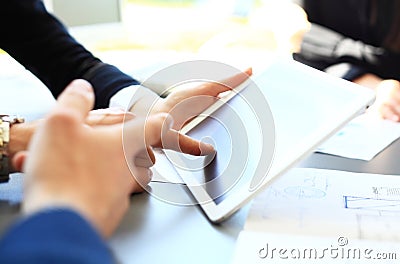 Businessman finger pointing to the screen of tablet-pc Stock Photo