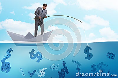 The businessman fishing dollars money from paper boat ship Stock Photo