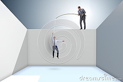 The businessman fishing his colleague in business concept Stock Photo