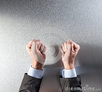 Businessman fists for symbol of power, conviction, frustration or impatience Stock Photo