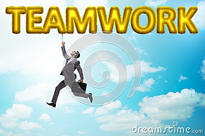 The businessman flying in teamwork concept Stock Photo